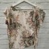 Blusa tostada floreada con nudo